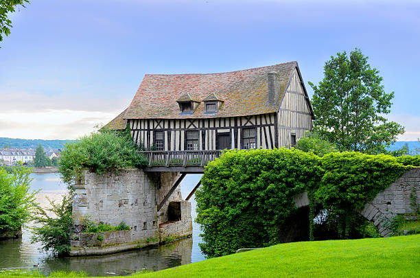 Old mill house on bridge, Seine river, Vernon, Normandy, France